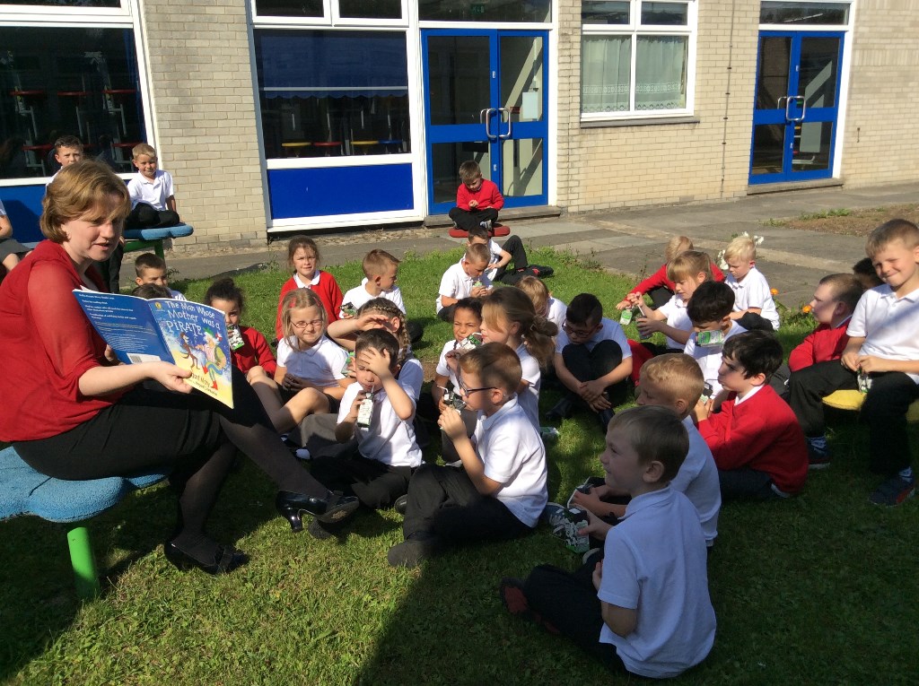 Enjoying-milk-whilst-listening-to-a-story-Y2